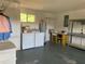 Functional utility area with window. Includes washer and dryer hookups and water heater at 11445 Sw 84Th Avenue Rd, Ocala, FL 34481