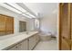 Spacious bathroom with bathtub, large vanity, and ample cabinet space at 11447 Sw 128Th Ave, Dunnellon, FL 34432