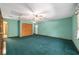 Spacious bonus room with carpet, ceiling fan and closet at 11447 Sw 128Th Ave, Dunnellon, FL 34432