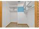 Walk-in closet with shelving and ample storage space at 11447 Sw 128Th Ave, Dunnellon, FL 34432