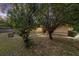 Charming single-story home featuring mature trees and a well-maintained front yard at 11447 Sw 128Th Ave, Dunnellon, FL 34432