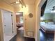 Hallway connecting Bedroom, main bedroom, and bathroom, offering convenient access to all spaces at 116 Nw 17Th Pl, Ocala, FL 34475