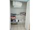 Organized linen closet with shelves and storage for linens and essentials at 11651 Sw 77Th Cir, Ocala, FL 34476