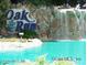 Water feature with community sign, creating an inviting and picturesque entrance to Oak Run at 11651 Sw 77Th Cir, Ocala, FL 34476