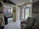 Inviting entryway with tile floors, natural light, and decorative accents at 11651 Sw 77Th Cir, Ocala, FL 34476