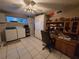This office features a laundry area and a built-in desk with storage at 11651 Sw 77Th Cir, Ocala, FL 34476