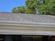 Close-up showing new roof and rain gutters at 11651 Sw 77Th Cir, Ocala, FL 34476