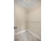 Walk-in closet with built-in shelving and matching marble tile floors at 13102 Se 101St Ave, Belleview, FL 34420