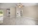 Bright living room with new white marble floors and neutral paint at 13102 Se 101St Ave, Belleview, FL 34420