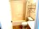 Bright bathroom featuring a tub-shower, toilet, and vanity with countertop space at 1402 Arredondo Dr, The Villages, FL 32162