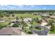 An aerial view of homes featuring well-manicured lawns and landscaping in a vibrant community at 1427 Sw 161St St, Ocala, FL 34473