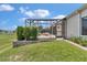 Backyard with lanai and green grass at 1427 Sw 161St St, Ocala, FL 34473