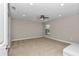 Spacious bedroom with carpet flooring, recessed lighting, and a ceiling fan at 1427 Sw 161St St, Ocala, FL 34473