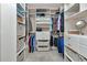 Walk-in closet with custom organizers, shelving, drawers and ample storage at 1427 Sw 161St St, Ocala, FL 34473