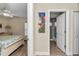 Hallway with tile flooring leading to the bathroom and bedroom at 1427 Sw 161St St, Ocala, FL 34473