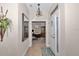Inviting entryway showcases a view into the home office, with tiled floors and natural light creating a warm welcome at 1427 Sw 161St St, Ocala, FL 34473