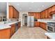 Beautiful kitchen with stainless steel appliances, tile floors and white countertops at 1427 Sw 161St St, Ocala, FL 34473