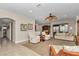 Spacious living area offers comfortable seating, seamless transition to adjacent rooms, and ample natural light for relaxing at 1427 Sw 161St St, Ocala, FL 34473