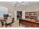Bright office space features neutral tones, dual desks, and an attached bookcase, creating a serene work environment at 1427 Sw 161St St, Ocala, FL 34473