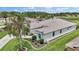 A beautiful single-story home with an expansive yard and lush tropical landscaping at 1427 Sw 161St St, Ocala, FL 34473