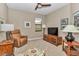 Comfortable sitting room with a plush recliner, side tables, and decorative accents providing relaxation and style at 1427 Sw 161St St, Ocala, FL 34473