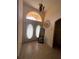 Welcoming foyer features double doors and transom window, providing ample natural light at 15011 Sw 61St Court Rd, Ocala, FL 34473