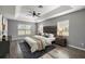 Main bedroom featuring a ceiling fan and natural light at 15465 Se 113Th Street Rd, Ocklawaha, FL 32179
