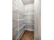 Walk-in pantry featuring wire shelving for organized storage at 15465 Se 113Th Street Rd, Ocklawaha, FL 32179