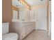 Bathroom featuring double sinks, vanity, and ample space at 1617 Se 29Th Ter, Ocala, FL 34471