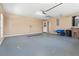Spacious two car garage with neutral paint, door to house, and plenty of room for storage at 1617 Se 29Th Ter, Ocala, FL 34471