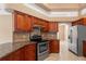 Modern kitchen boasts stainless steel appliances and granite countertops at 1617 Se 29Th Ter, Ocala, FL 34471