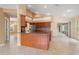 Open-concept kitchen with island and seamless access to the lanai at 1617 Se 29Th Ter, Ocala, FL 34471