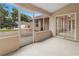 A lovely screened-in patio overlooks backyard and the detached garage at 1617 Se 29Th Ter, Ocala, FL 34471