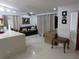 Bright living room featuring tile floors, neutral paint, and contemporary furnishings, creating a comfortable space at 1737 Griffin Ave, Lady Lake, FL 32159