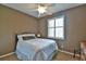Cozy bedroom with a comfortable bed, a window with plantation shutters, and soft lighting at 2550 Nw 55Th Avenue Rd, Ocala, FL 34482