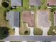 Drone shot displaying the layout, curb appeal, and neighborhood of the residence from above at 2594 Berrington Loop, The Villages, FL 32162