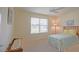 Bedroom with neutral carpet and a sunlit window at 2594 Berrington Loop, The Villages, FL 32162