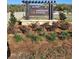 Community entrance sign amidst landscaping at 2945 Ne 21St Terrace Rd, Ocala, FL 34470