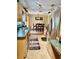 Spacious kitchen featuring stainless steel appliances and a view into the dining area at 3106 Silver Palm Dr, Edgewater, FL 32141