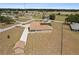 This aerial view offers a complete perspective of the backyard, showcasing the expansive surroundings at 4725 County Road 121D, Wildwood, FL 34785