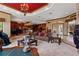 Open-concept living space with views into the kitchen at 4725 County Road 121D, Wildwood, FL 34785