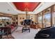 Cozy living room with recessed lighting, large windows, and comfortable seating at 4725 County Road 121D, Wildwood, FL 34785