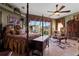 Main bedroom featuring a canopy bed, and outdoor views at 4725 County Road 121D, Wildwood, FL 34785