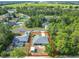 Charming single Gathering home featuring a well-manicured lawn and mature trees in a peaceful neighborhood at 5195 Sw 128Th Street Rd, Ocala, FL 34473