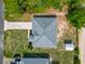 Aerial view of a single Gathering home showing the roof, yard, drive and small outbuilding at 5195 Sw 128Th Street Rd, Ocala, FL 34473