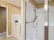 Bathroom featuring a walk-in tub, a shower, and neutral walls at 5195 Sw 128Th Street Rd, Ocala, FL 34473