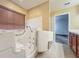 Bathroom with a walk-in tub and a large window at 5195 Sw 128Th Street Rd, Ocala, FL 34473