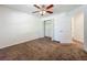 Bedroom featuring bi-fold closet doors and a neutral color scheme at 5195 Sw 128Th Street Rd, Ocala, FL 34473