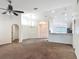 Open-concept living space with views to the kitchen and entryway at 5195 Sw 128Th Street Rd, Ocala, FL 34473