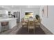 Dining room with luxury vinyl plank flooring and sliding glass doors to the backyard at 5389 Nw 65Th St, Ocala, FL 34482